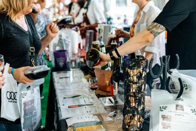 Wine being poured at GrapeFest People's Choice Wine Tasting Classic