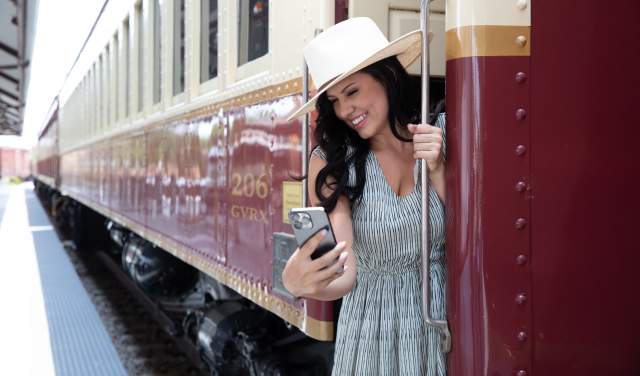 Woman taking a selfie on a Grapevine Vintage Railroad train