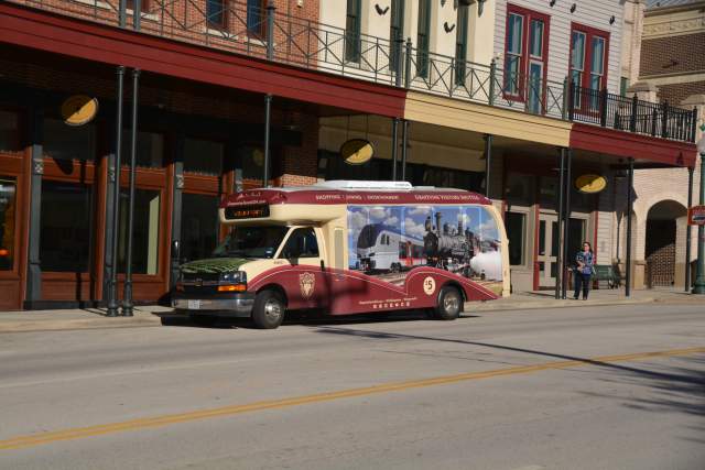 grapevine visitors shuttle parked on main street