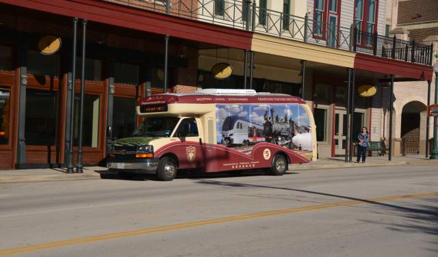 grapevine visitors shuttle parked on main street